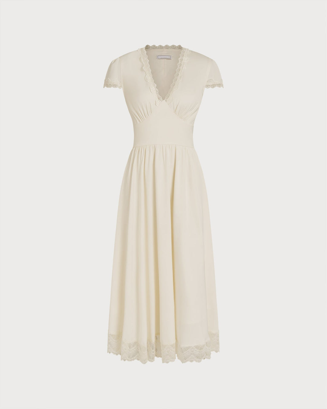 Éliane | Robe longue col V en dentelle abricot