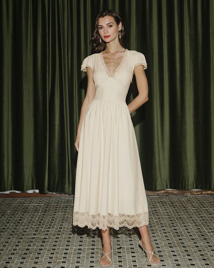 Éliane | Robe longue col V en dentelle abricot